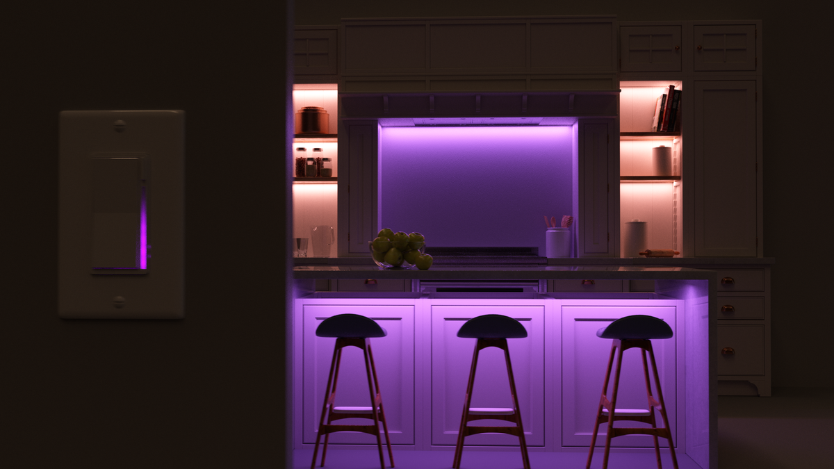 Dimly lit modern kitchen with purple ambient lighting from Zigbee controlled LEDs under the island and glowing cabinets.